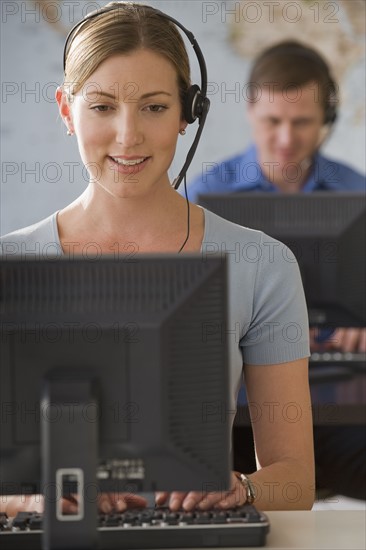 Call center employees working.