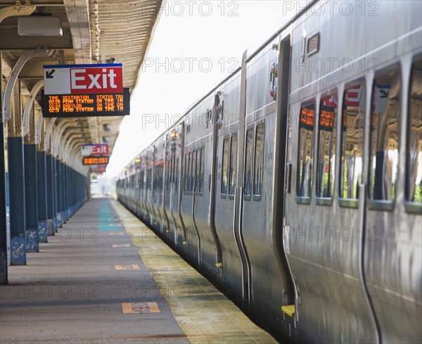 Commuter train parked at station platform. Date : 2008