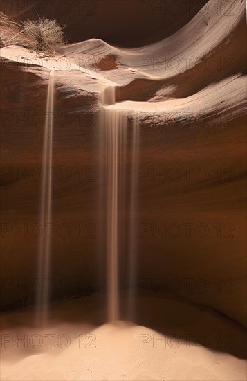 Sand falling into Upper Antelope Canyon, Page, Arizona.