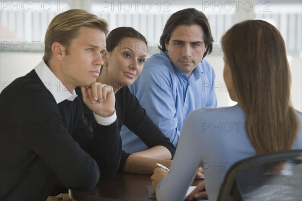 Business people in meeting.