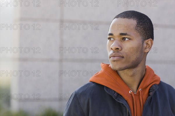 Portrait of young man looking pensive. Date: 2008