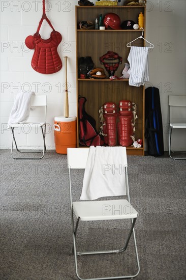 Baseball equipment in locker room. Date : 2008