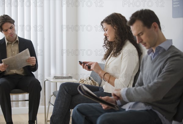 Patients sitting in waiting room.