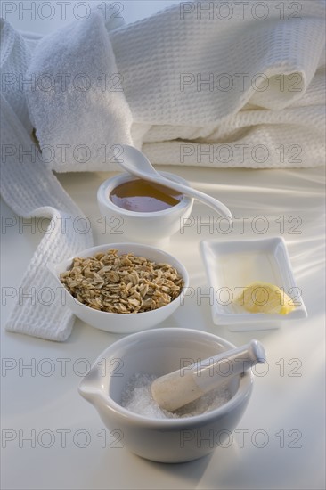 Oatmeal, honey, and lemon spa facial treatment.