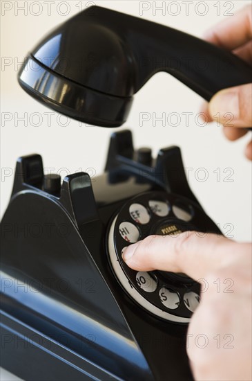 Hand dialing rotary telephone.