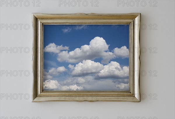 Framed picture of cloudy sky.