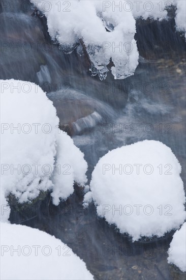 Snowy stream in winter.