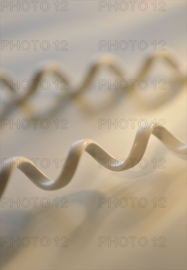 Close up of telephone cord.