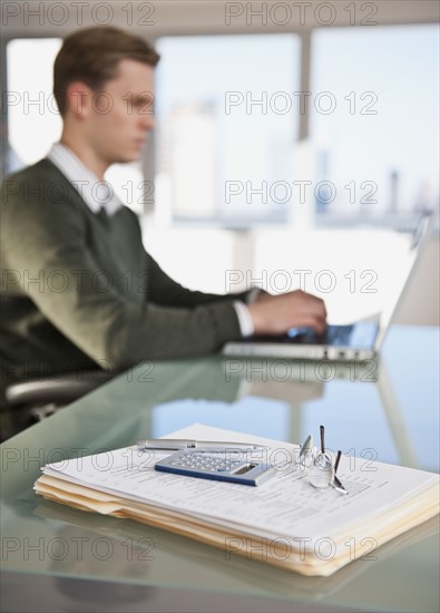 Businessman working in office.