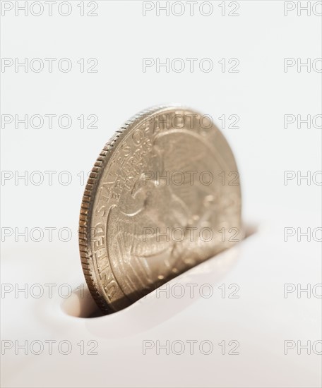 Close up of dollar bill in pocket. Photographe : Jamie Grill