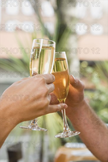 Couple toasting with champagne.