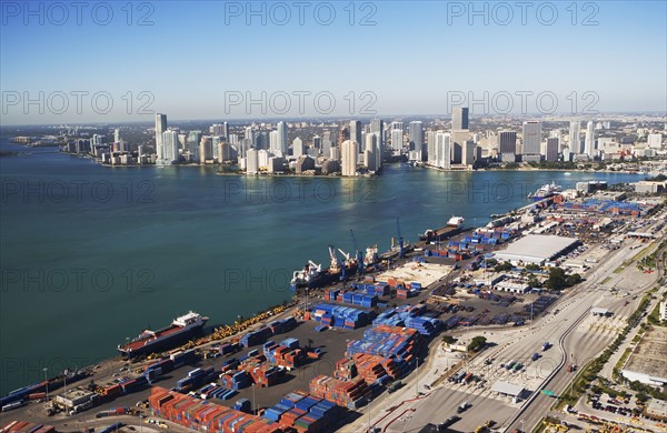 Aerial view of waterfront city and port. Photographe : fotog