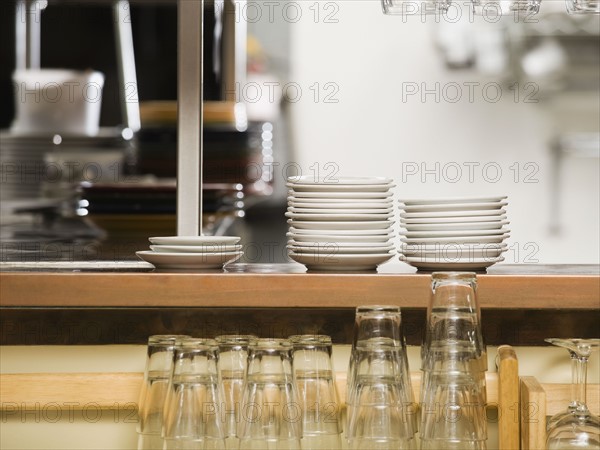 Clean dishes in restaurant.