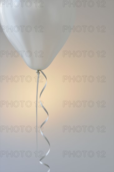 Balloon and ribbon.