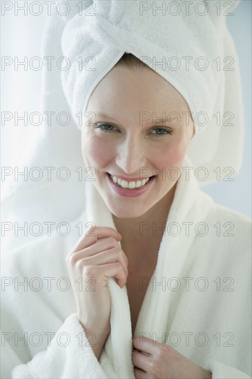 Woman in robe and towel.