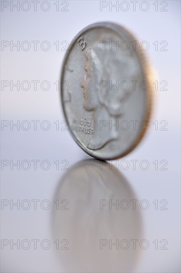 Close up of silver coin.