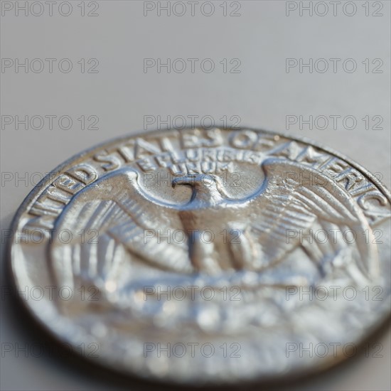 Close up of silver coin.