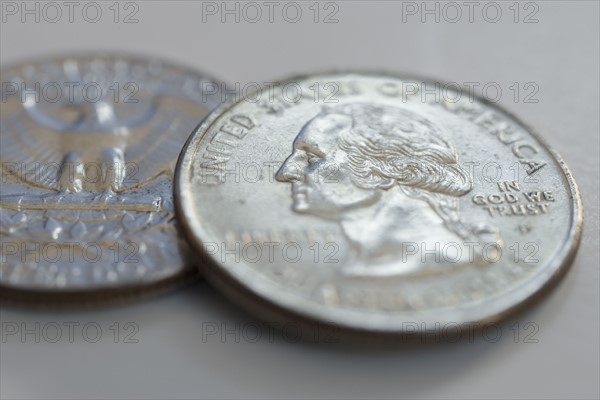 Close up of silver coins.