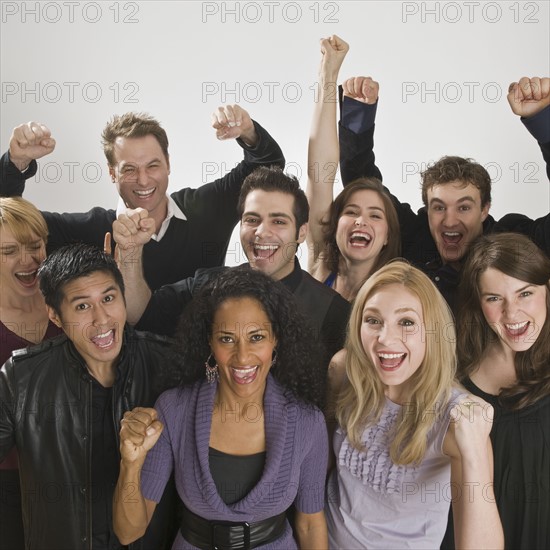 Group of friends cheering.