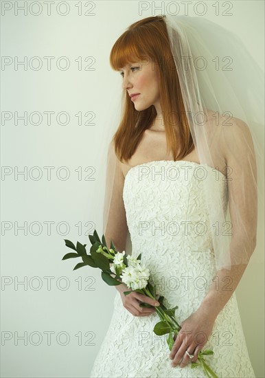 Bride in wedding dress.