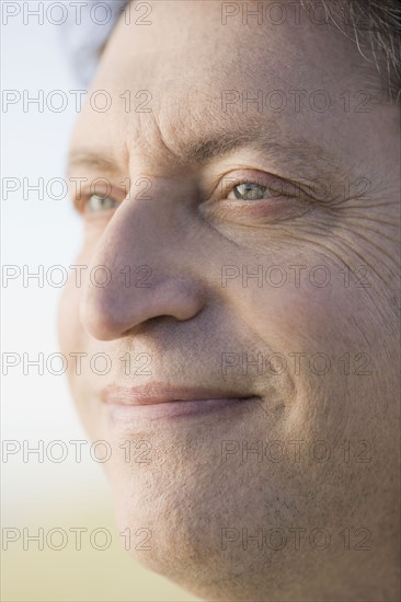 Close up of mature businessman. Photographe : PT Images