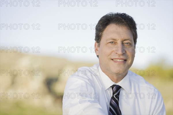 Portrait of businessman. Photographe : PT Images
