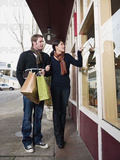 Couple window shopping.