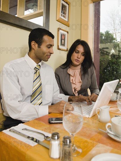 Businesspeople meeting in restaurant.