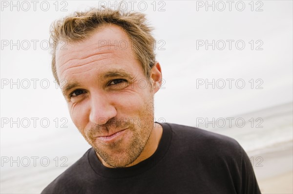 Portrait of man on beach. Photographe : Sarah M. Golonka