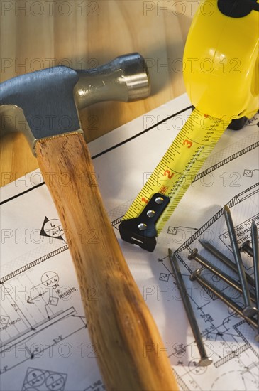 Close up of blueprint and tools. Photographe : Daniel Grill