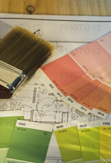 Close up of blueprint and painting supplies. Photographe : Daniel Grill