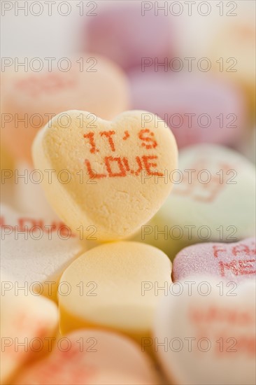Close up of candy hearts.
