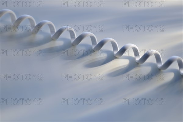 Close up of telephone cord.