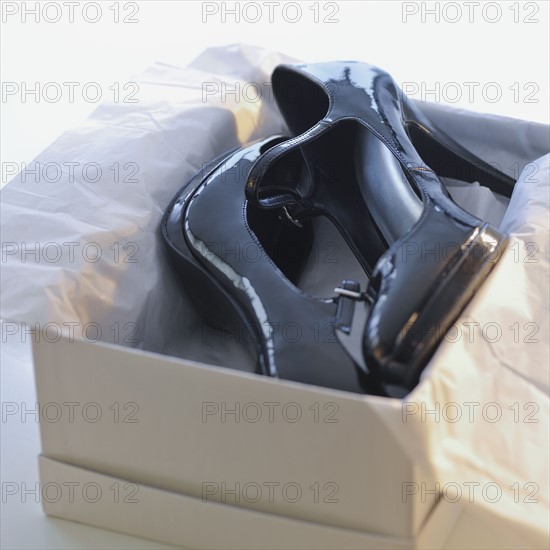 Pair of high heels in box.