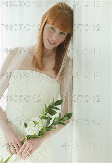 Bride in wedding dress.