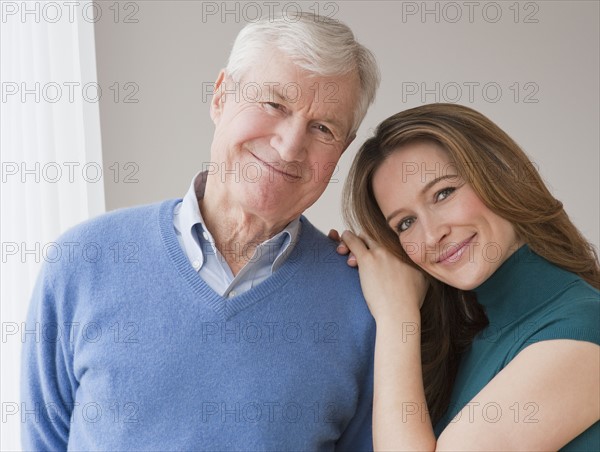 Portrait of senior man and daughter.