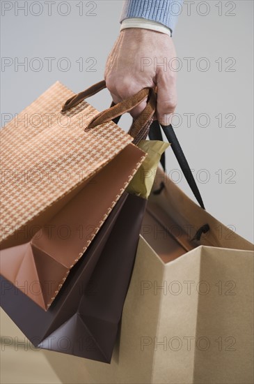 Man carrying shopping bags.