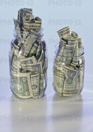 Jars full of money.