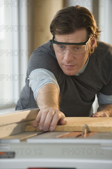 Construction worker cutting board.