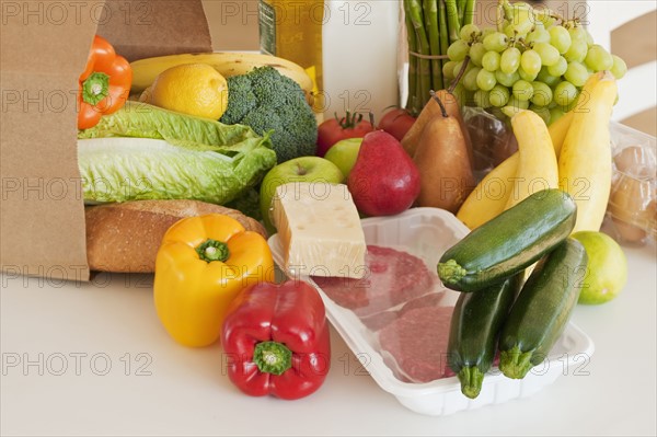 Paper bag filled with groceries.