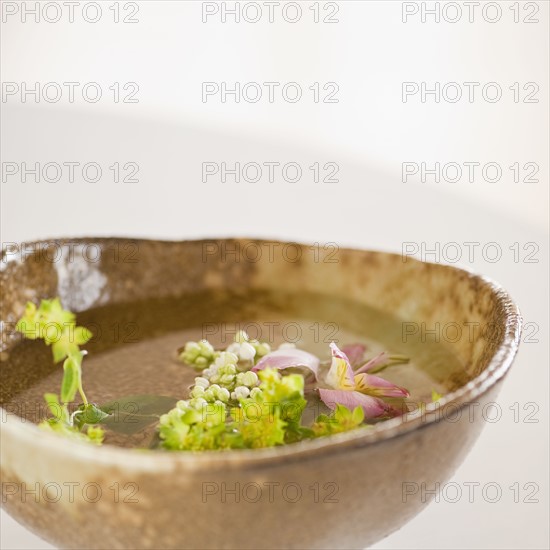 Woman holding aromatherapy bowl.