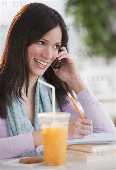 Woman talking on phone.