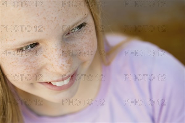 Close-up of smiling girl (10-12). Photographe : Sarah M. Golonka