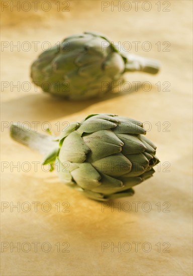 Two artichokes.