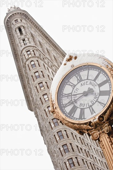 Flatiron Building and clock, Manhattan, New York City, New York, USA.