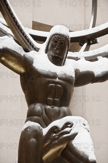 Statue of Atlas at Rockefeller Center in winter, Manhattan, New York City, New York, USA.