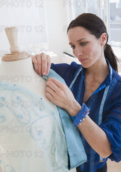 Female tailor at work.