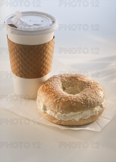 Bagel with coffee.