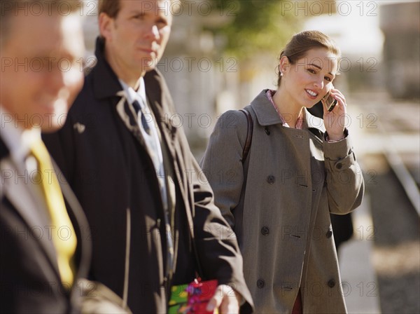 Businesswoman using cellular phone