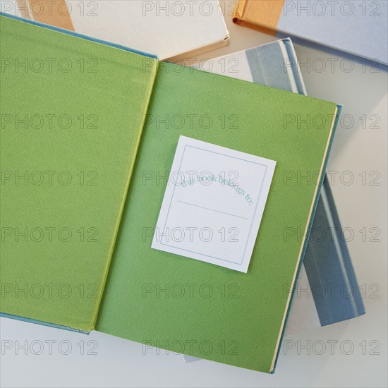 Pile of books, studio shot. Photographe : Jamie Grill